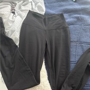 Aritzia butter flare leggings golden